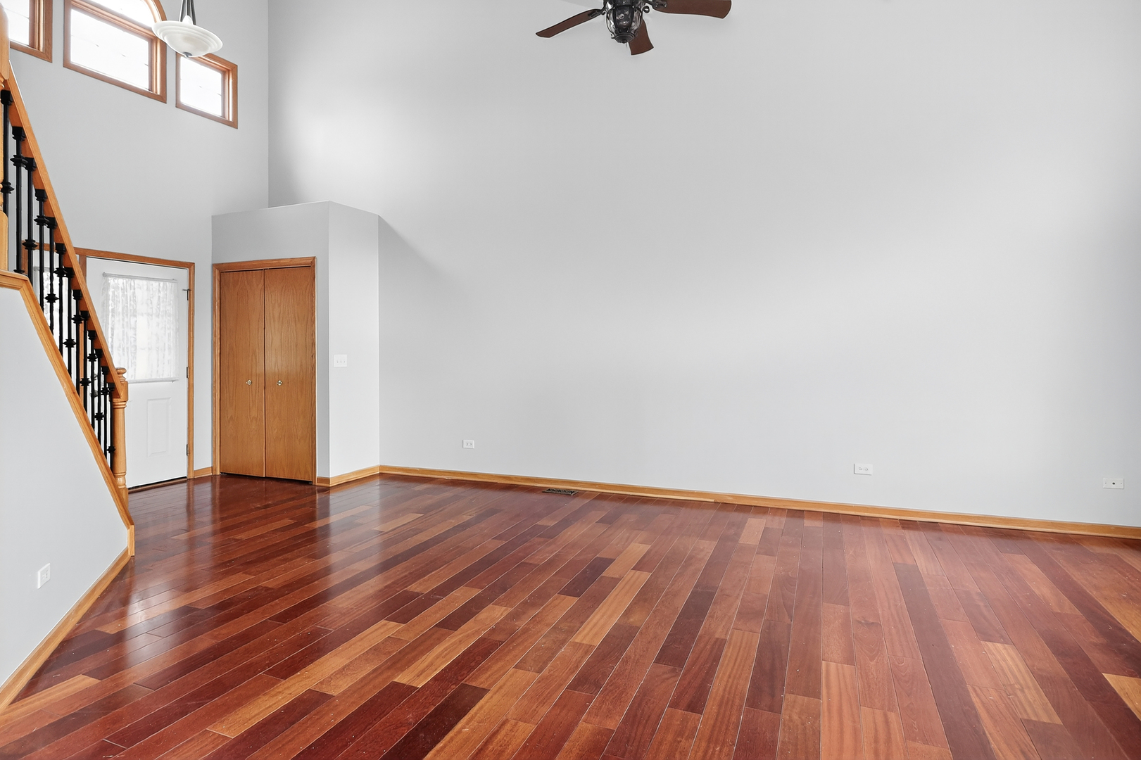 110 Harper Lane Lemont, IL 60439 - Photo 10 of 29 a view of an empty room with wooden floor and a window