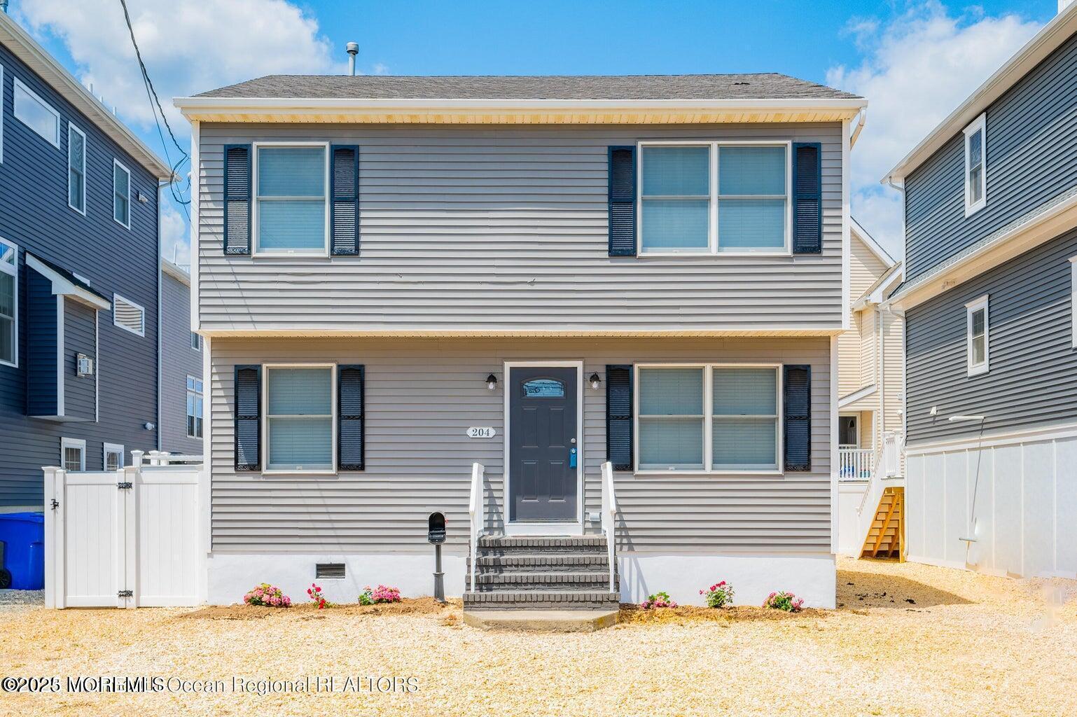 204 Coolidge Avenue Seaside Heights, NJ 08751 - Photo 1 of 22 a front view of a house