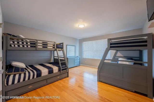 a view of a livingroom with furniture and staircase