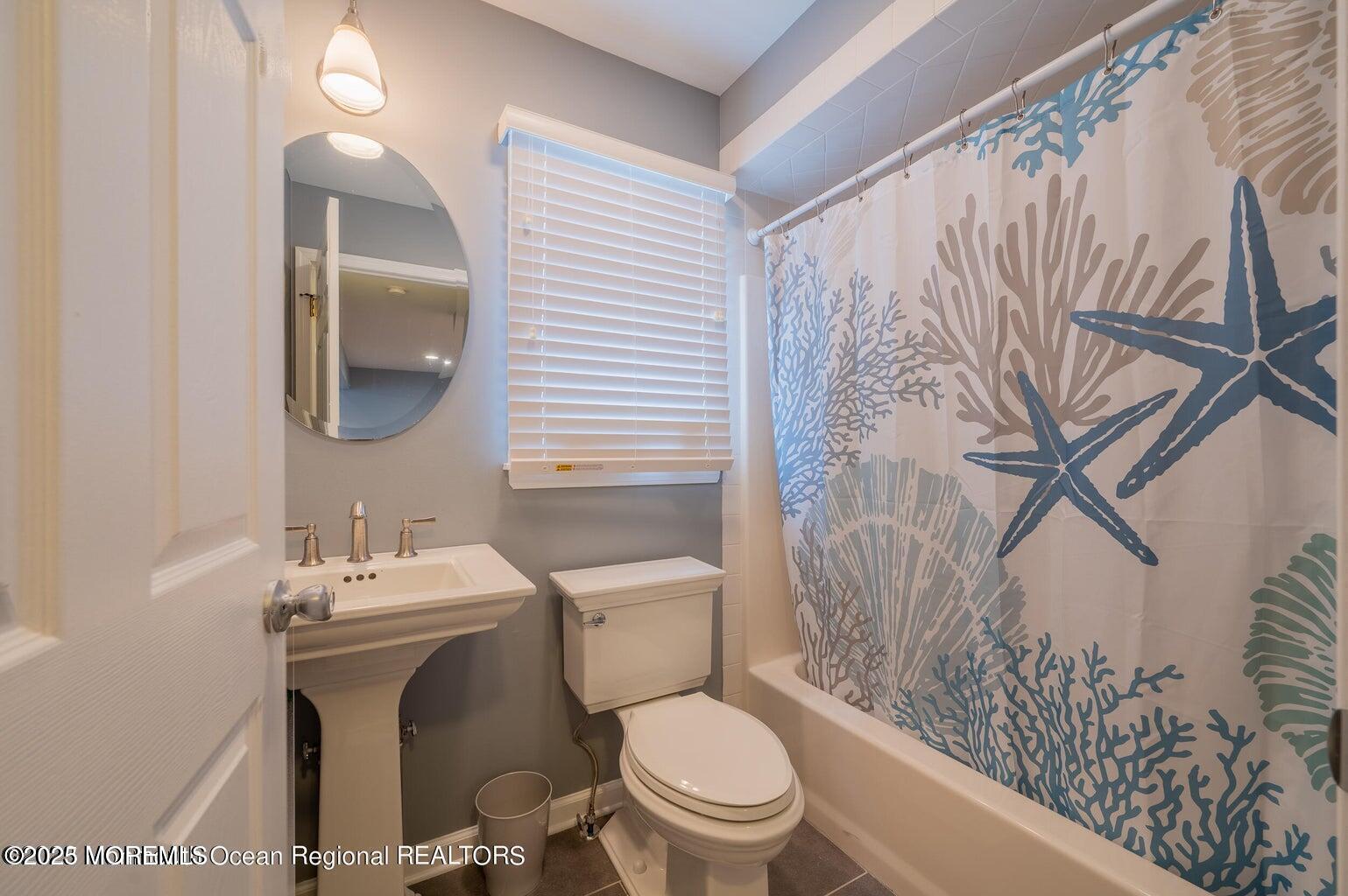 204 Coolidge Avenue Seaside Heights, NJ 08751 - Photo 6 of 22 a bathroom with a toilet sink and shower