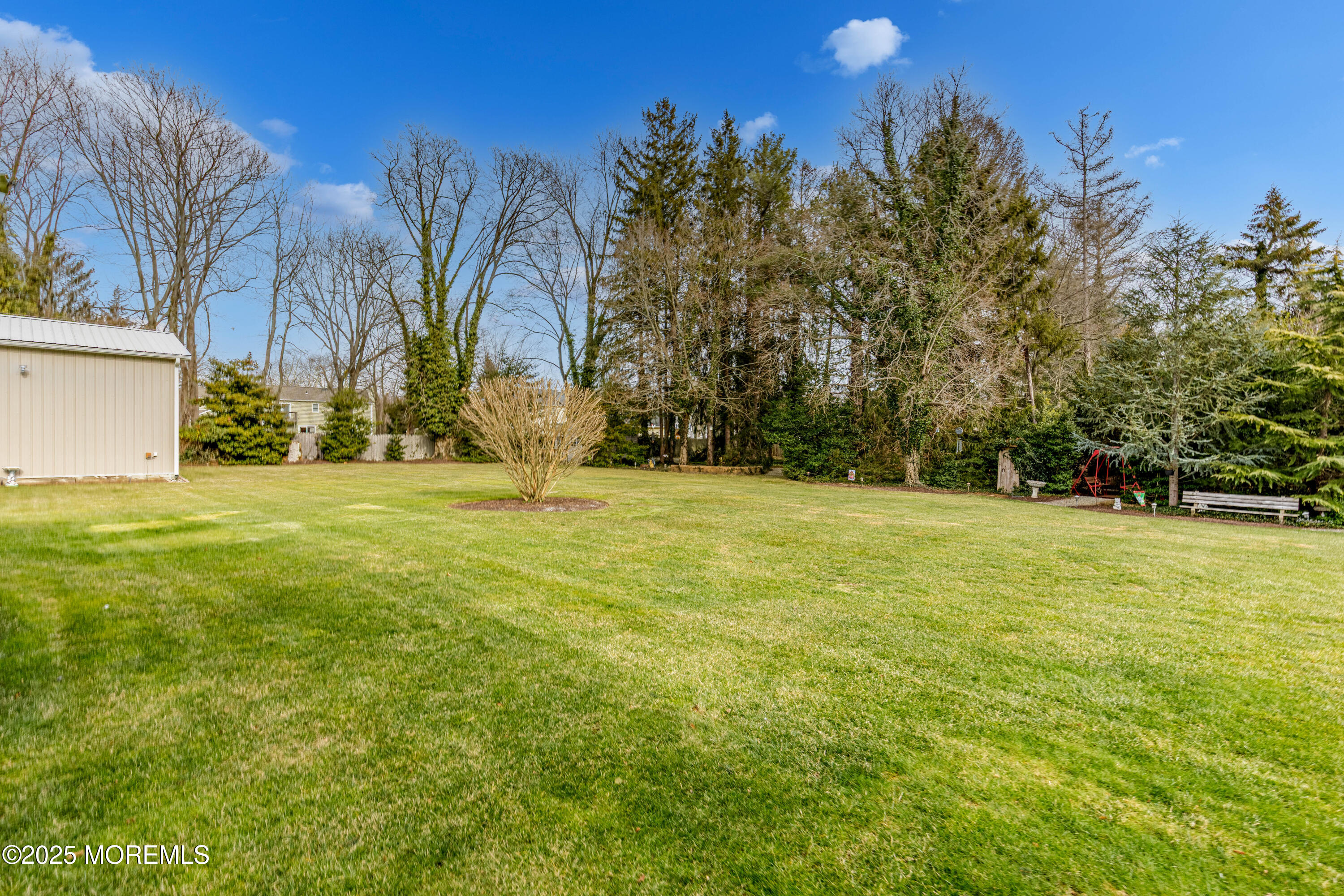 63 North New Prospect Road Jackson, NJ 08527 - Photo 17 of 43 a view of swimming pool with an outdoor space and seating area