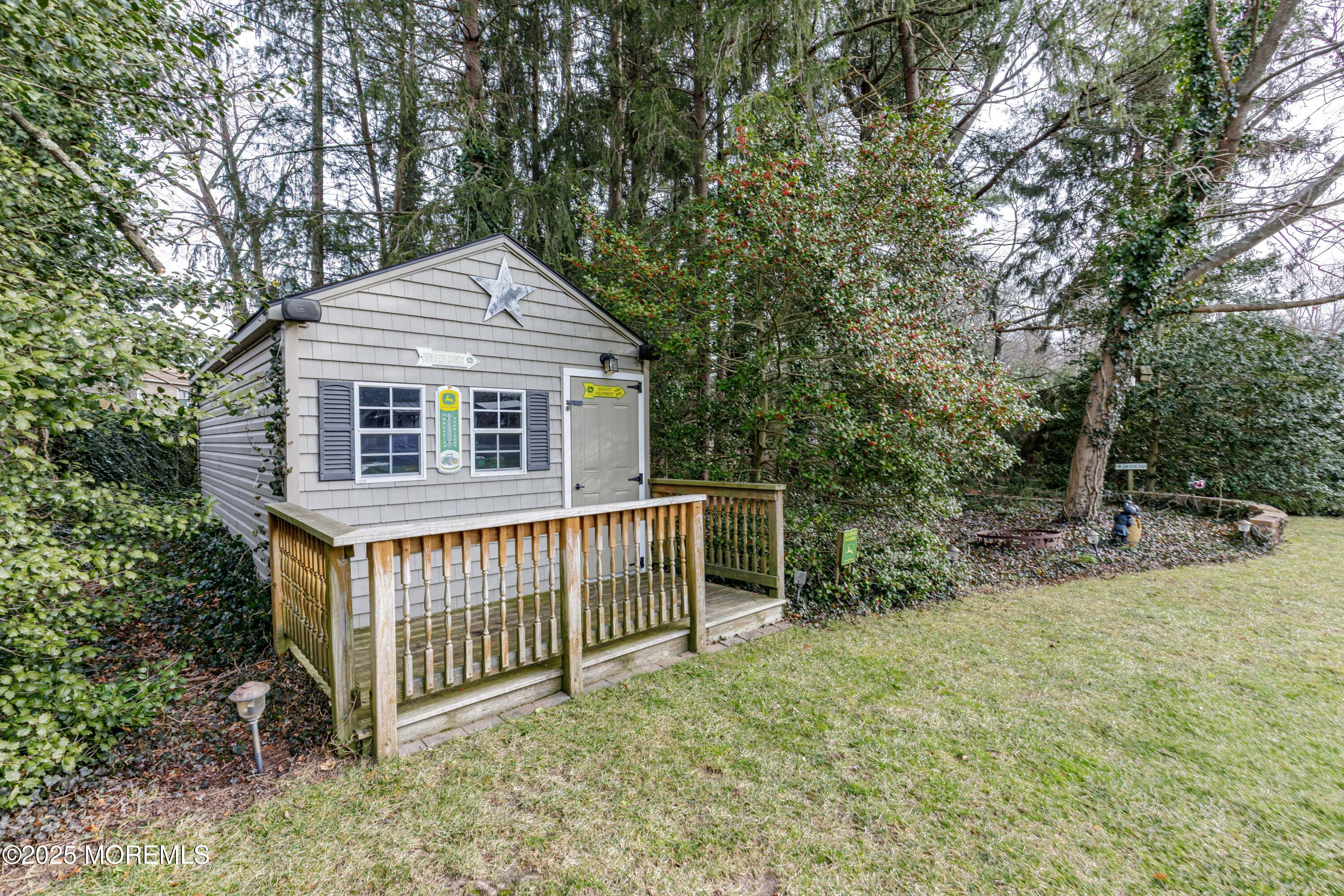 63 North New Prospect Road Jackson, NJ 08527 - Photo 24 of 43 a front view of a house with garden