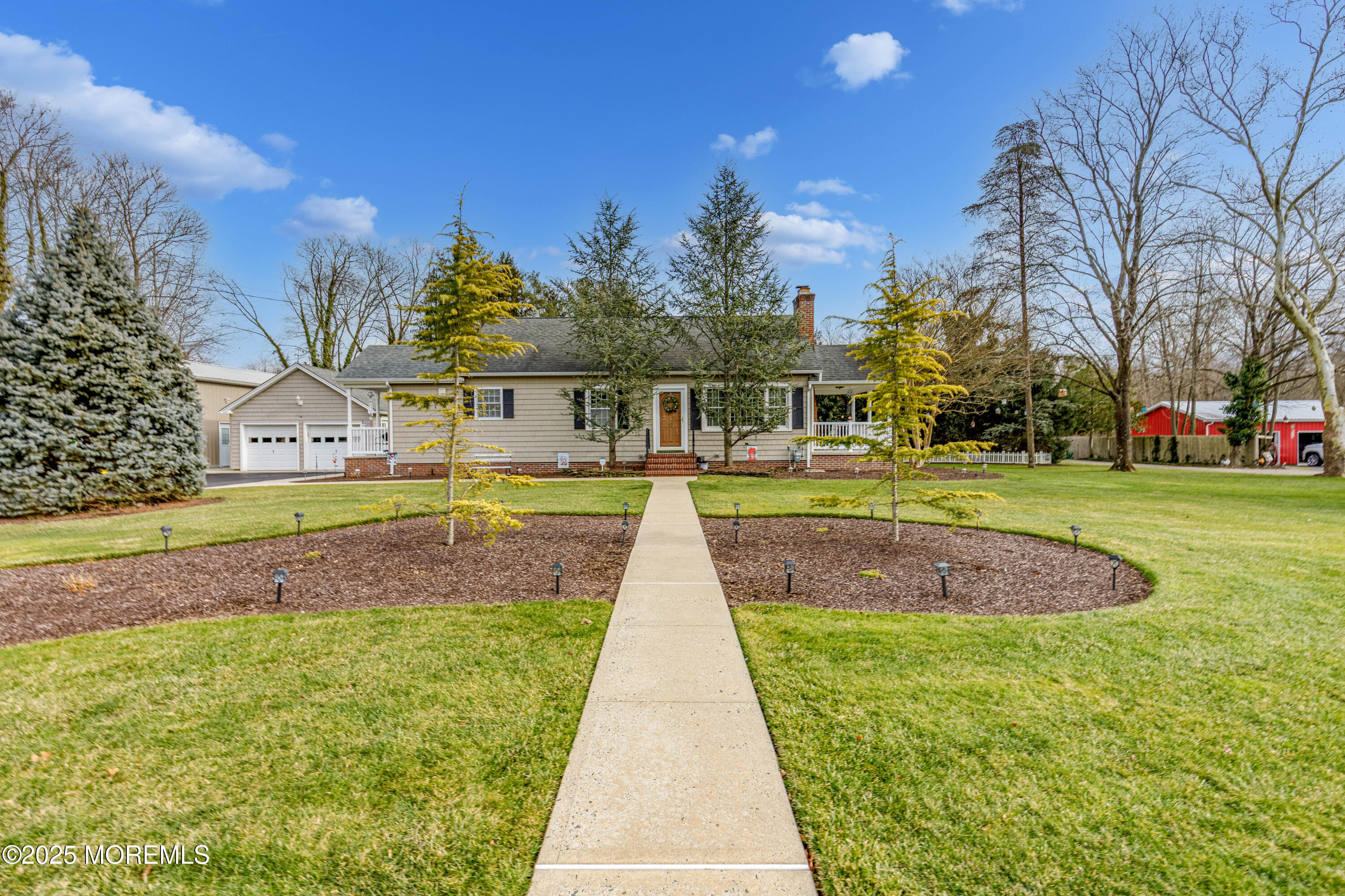 63 North New Prospect Road Jackson, NJ 08527 - Photo 3 of 43 a view of yard with swimming pool and trees