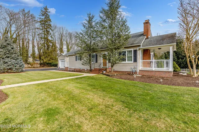 a front view of house with yard