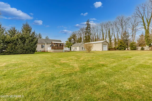 a view of a large body of water with a building in the background