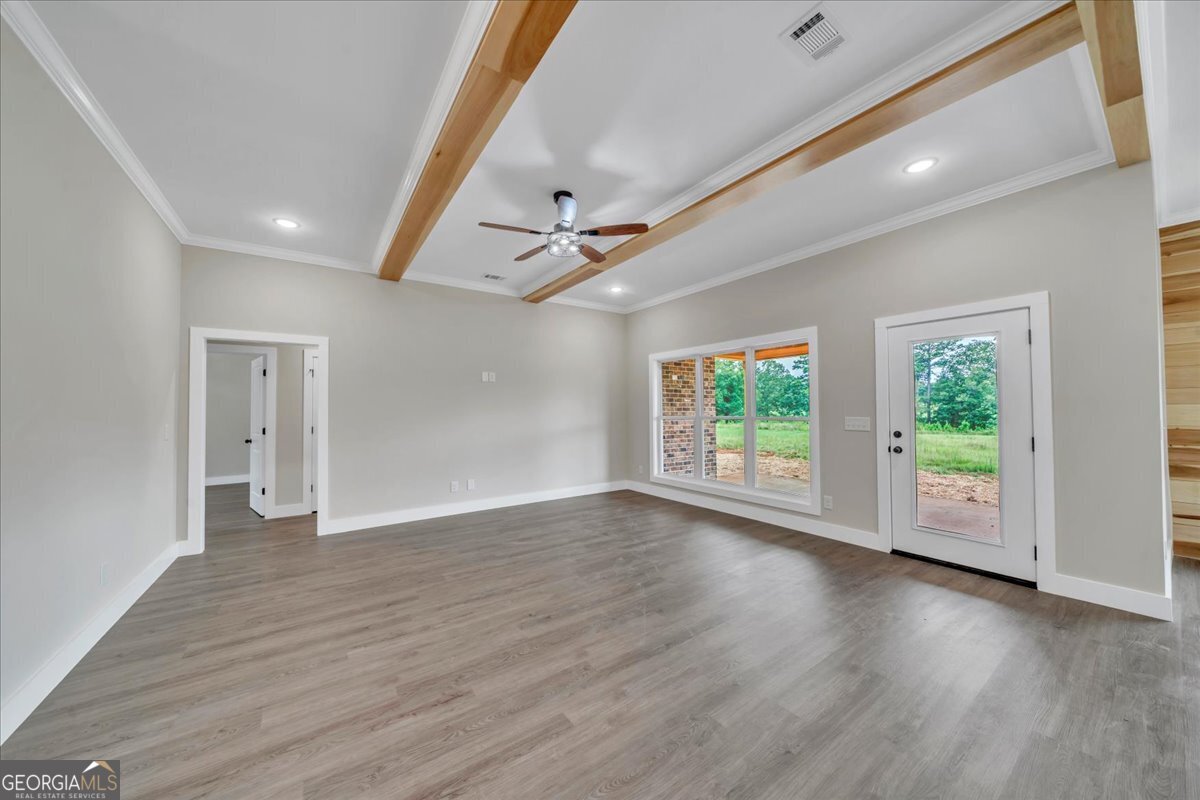 87 River Ridge Drive Hawkinsville, GA 31036 - Photo 14 of 65 a view of livingroom with hardwood floor and window