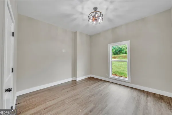 an empty room with a window