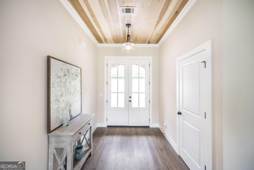 87 River Ridge Drive Hawkinsville, GA 31036 - Photo 3 of 65 a view of entryway with wooden floor