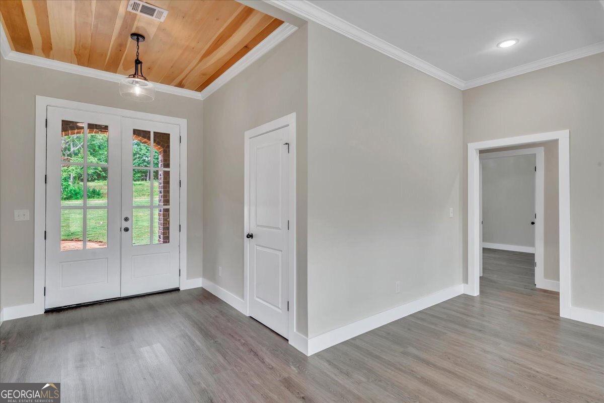 87 River Ridge Drive Hawkinsville, GA 31036 - Photo 4 of 65 a view of entryway with wooden floor