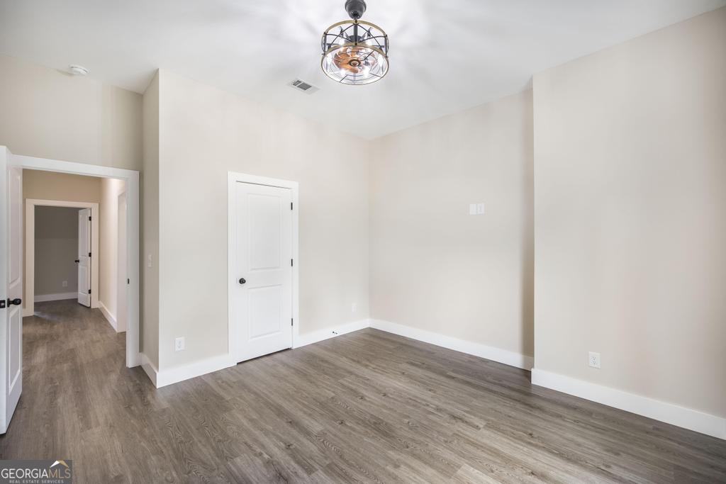 87 River Ridge Drive Hawkinsville, GA 31036 - Photo 43 of 65 wooden floor in an empty room