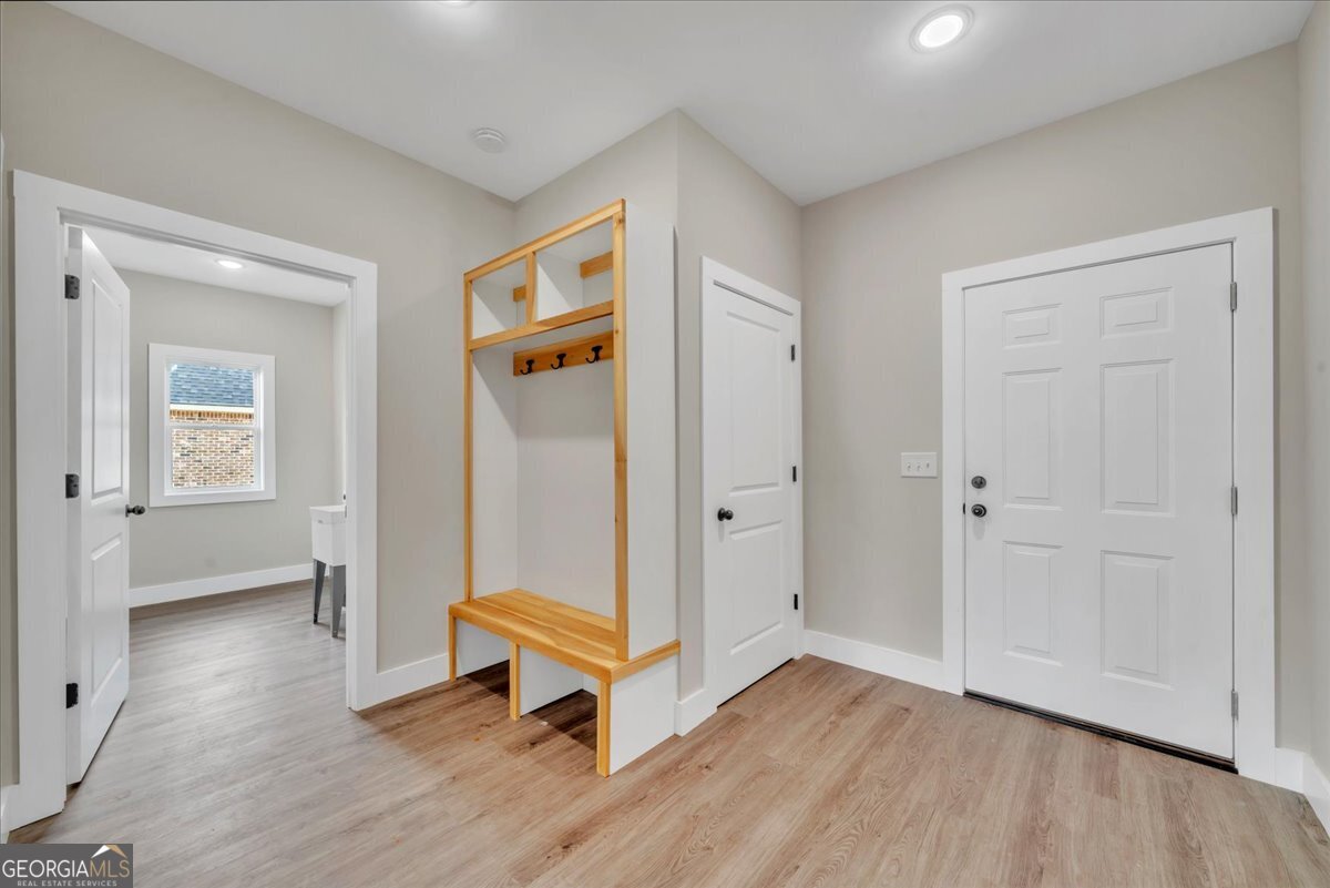 87 River Ridge Drive Hawkinsville, GA 31036 - Photo 48 of 65 a view of a room with wooden floor cabinet and windows