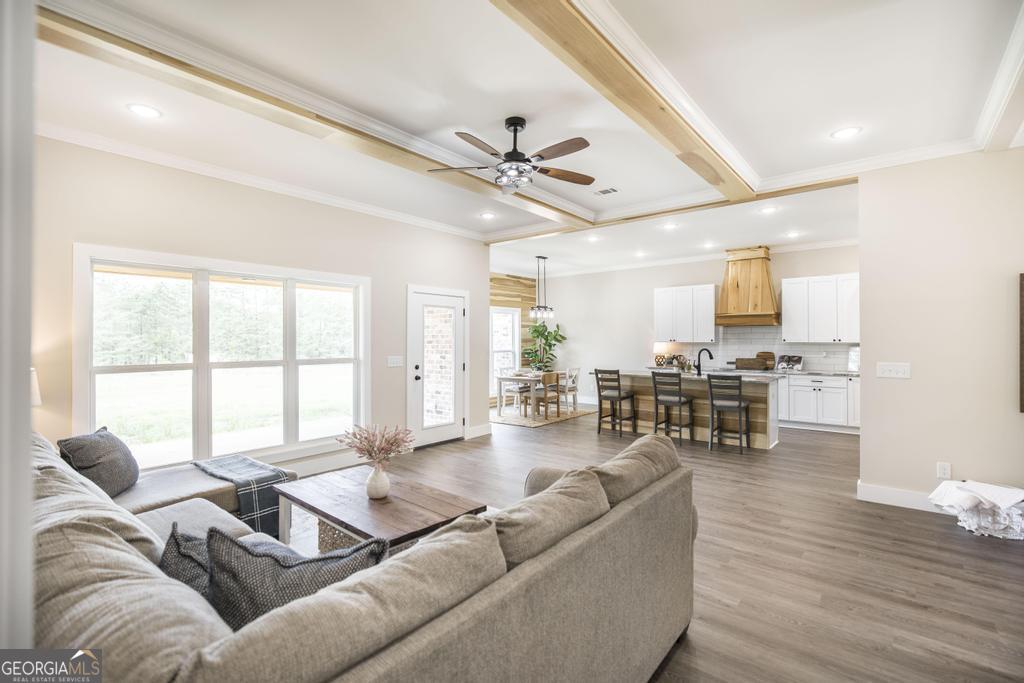 87 River Ridge Drive Hawkinsville, GA 31036 - Photo 5 of 65 a living room with furniture and a large window