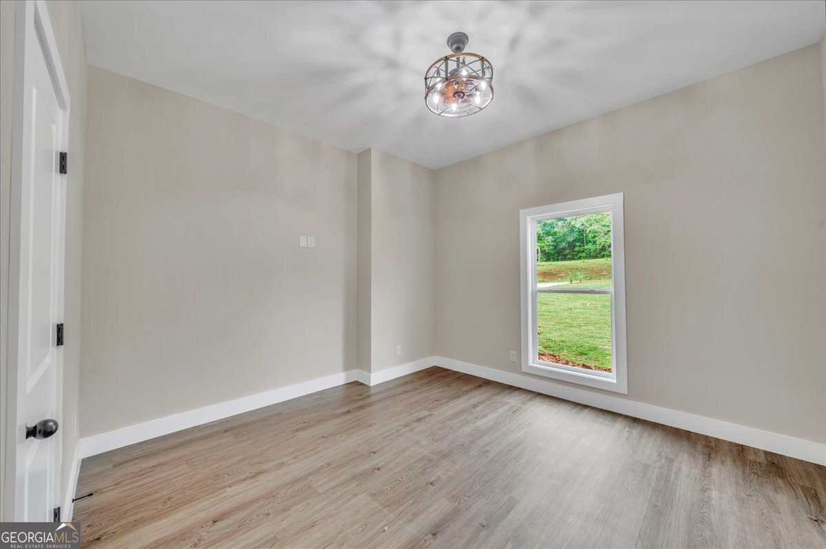 87 River Ridge Drive Hawkinsville, GA 31036 - Photo 54 of 65 an empty room with a window
