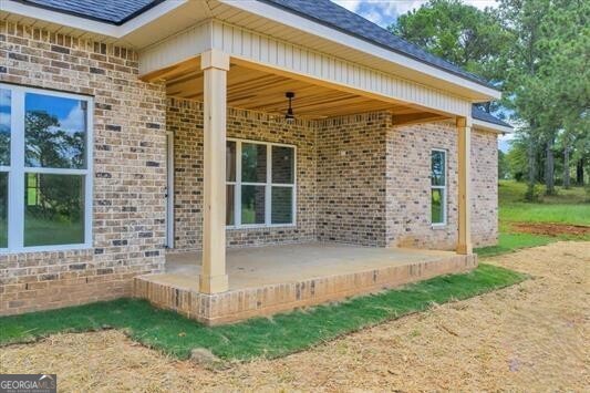 87 River Ridge Drive Hawkinsville, GA 31036 - Photo 55 of 65 a front view of a house with a yard