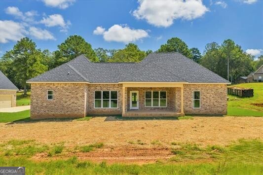 87 River Ridge Drive Hawkinsville, GA 31036 - Photo 57 of 65 a front view of a house with a yard