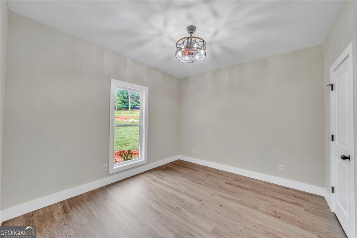 87 River Ridge Drive Hawkinsville, GA 31036 - Photo 58 of 65 a view of an empty room with a window