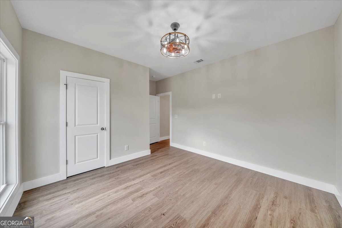 87 River Ridge Drive Hawkinsville, GA 31036 - Photo 62 of 65 a view of an empty room and a window