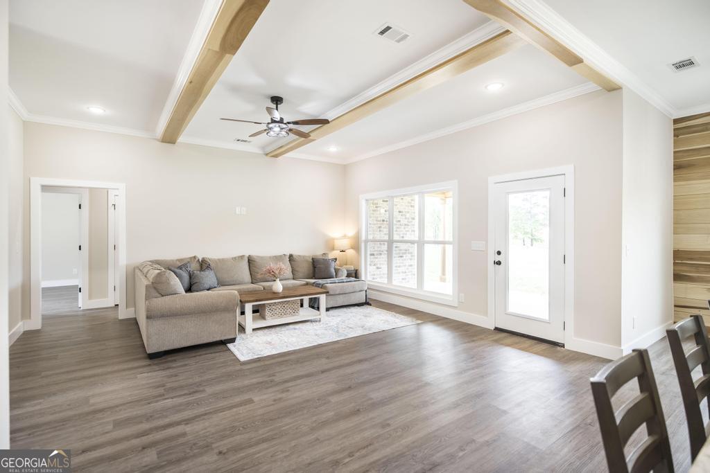 87 River Ridge Drive Hawkinsville, GA 31036 - Photo 7 of 65 a living room with furniture window and wooden floor