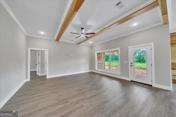 a view of livingroom with hardwood floor and window