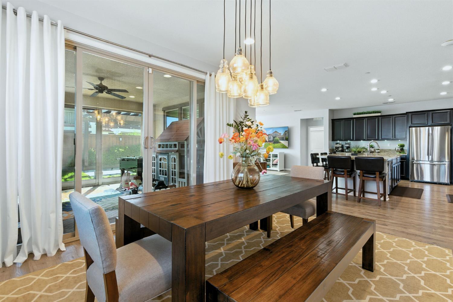 18200 Broadmoor Way Lathrop, CA 95330 - Photo 19 of 48 dining area featuring light wood finished floors, recessed lighting, and ceiling fan