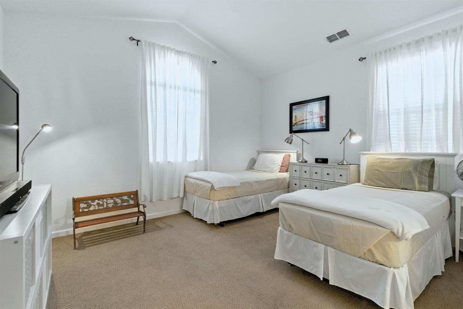 18200 Broadmoor Way Lathrop, CA 95330 - Photo 25 of 48 bedroom featuring lofted ceiling and light carpet