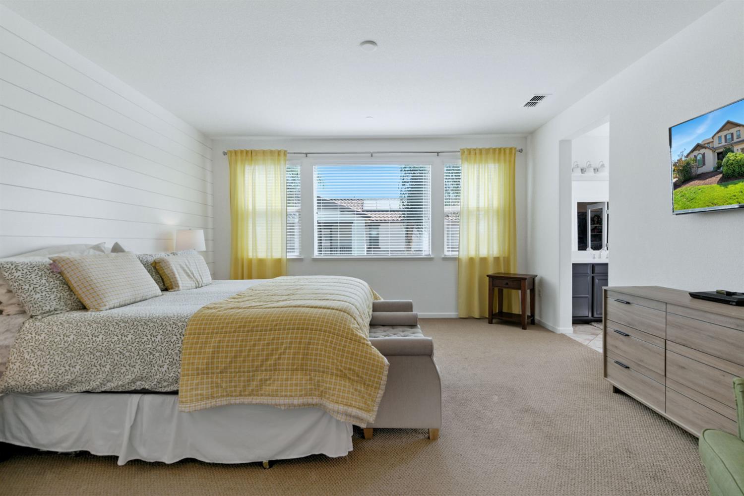 18200 Broadmoor Way Lathrop, CA 95330 - Photo 29 of 48 bedroom featuring light colored carpet and connected bathroom