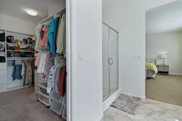 a bathroom with a sink vanity and mirror
