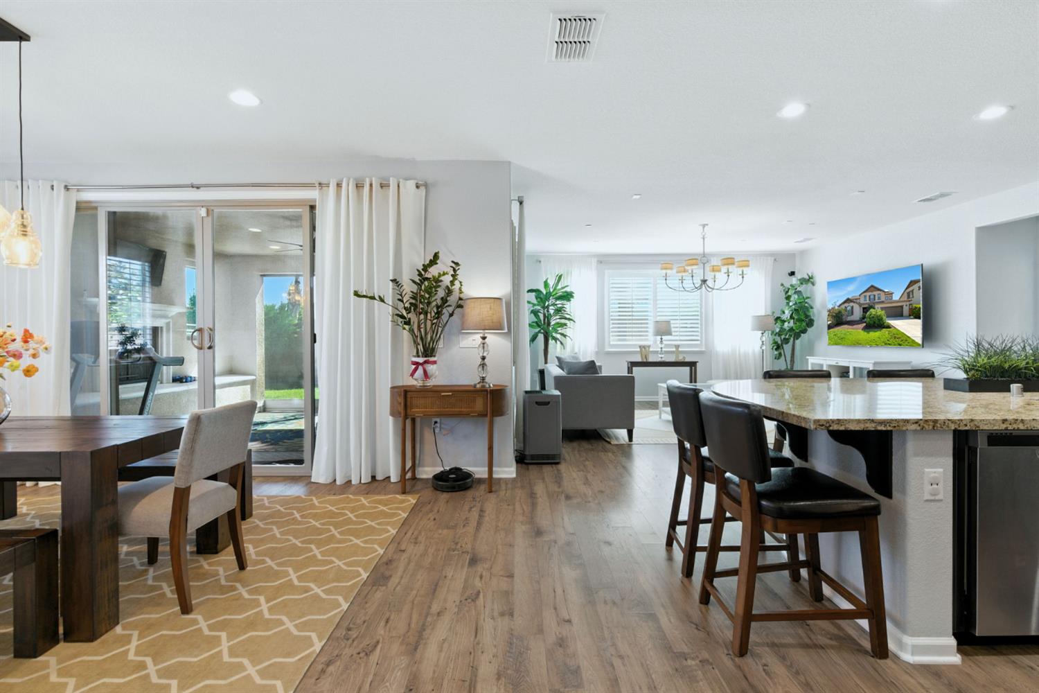 18200 Broadmoor Way Lathrop, CA 95330 - Photo 8 of 48 dining room with a chandelier, light wood-style flooring, and recessed lighting