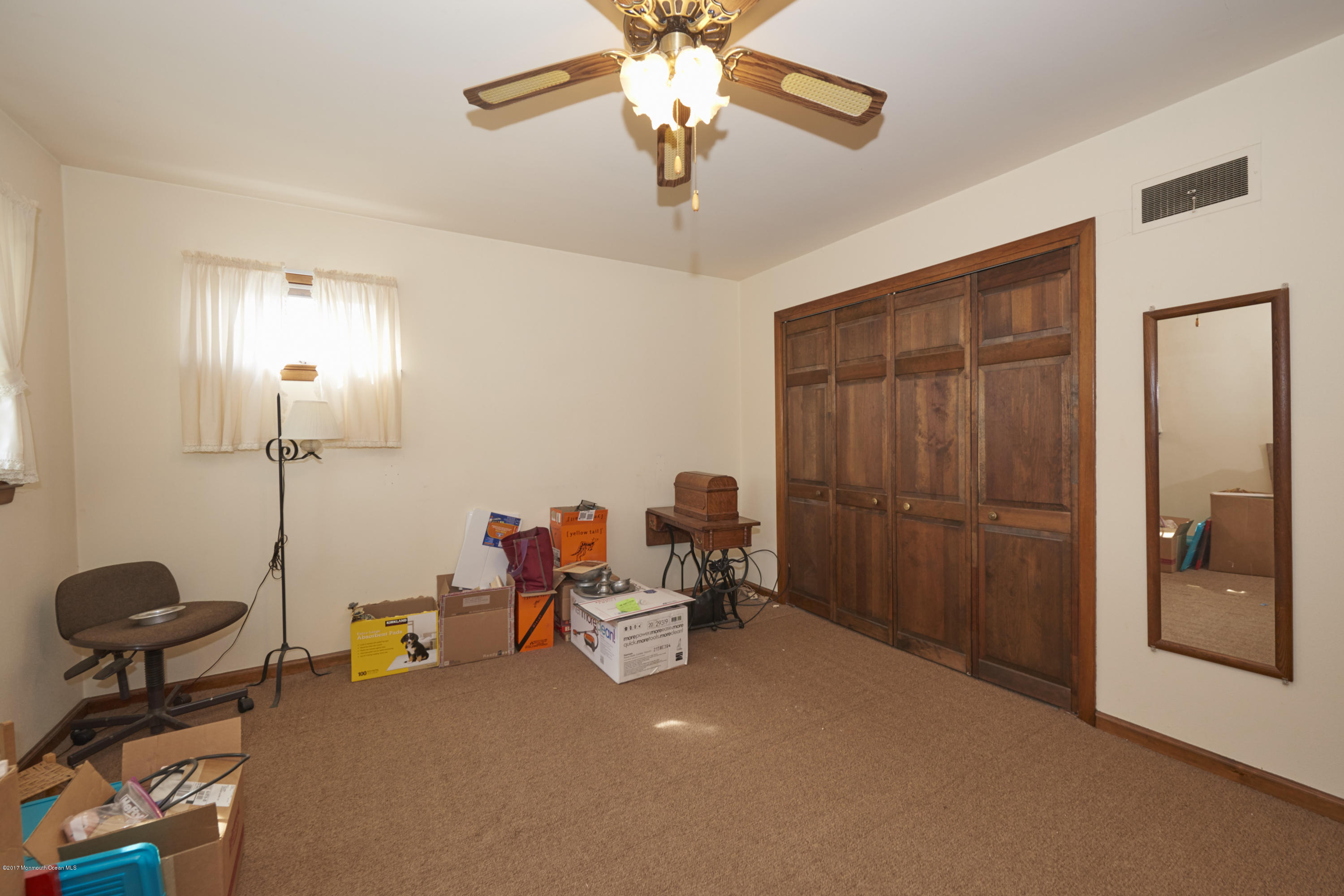 22 Maple Avenue Little Silver, NJ 07739 - Photo 11 of 25 a room with a chair and gym equipment