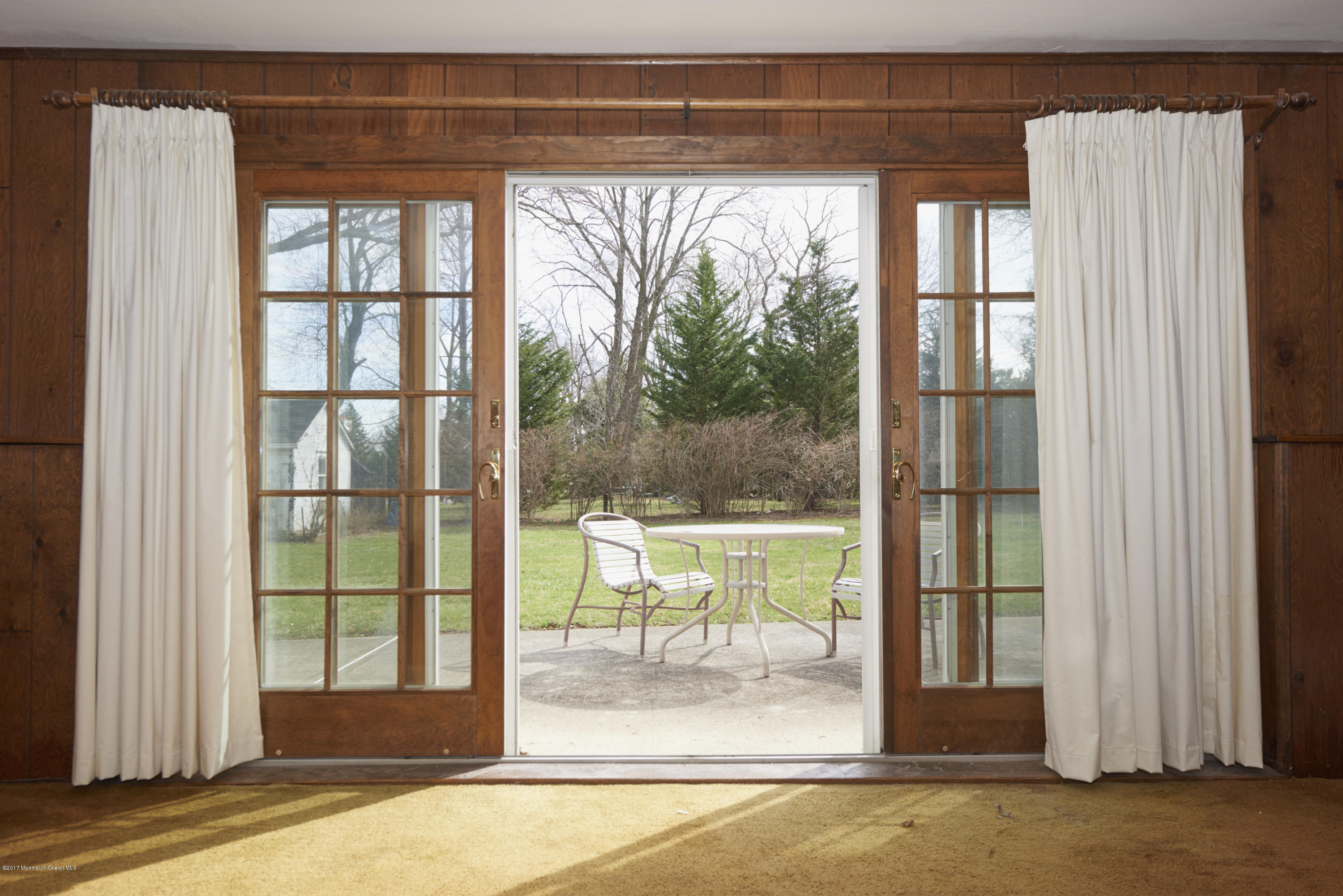 22 Maple Avenue Little Silver, NJ 07739 - Photo 15 of 25 a view of a porch with a floor to ceiling window