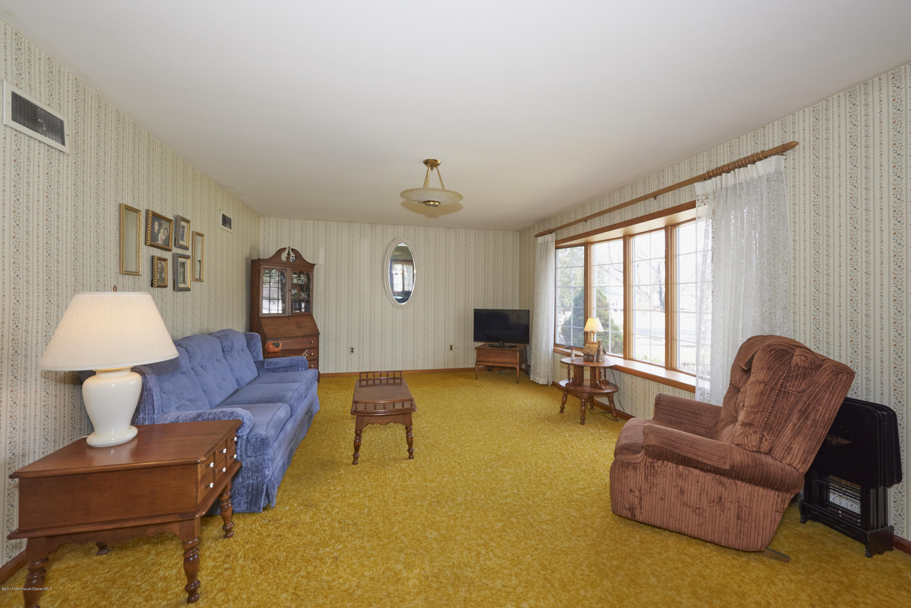 22 Maple Avenue Little Silver, NJ 07739 - Photo 3 of 25 a living room with furniture and a table