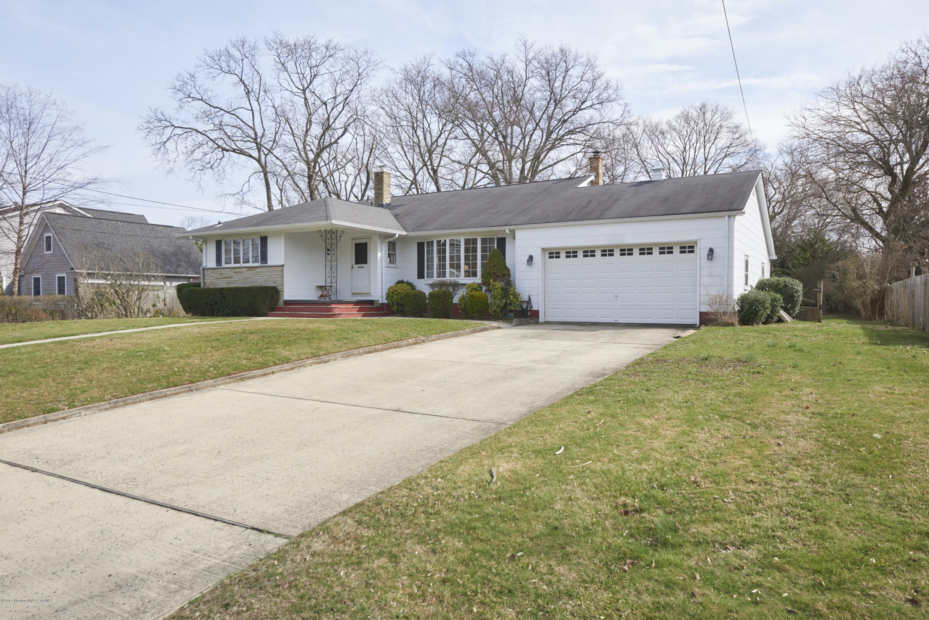22 Maple Avenue Little Silver, NJ 07739 - Photo 24 of 25 a view of large house with a big yard and large trees