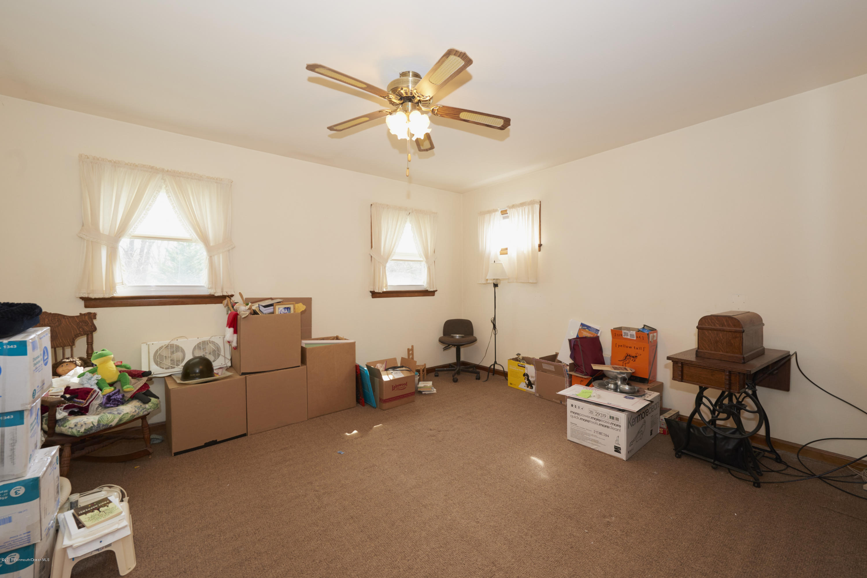 22 Maple Avenue Little Silver, NJ 07739 - Photo 10 of 25 a living room with furniture and a window