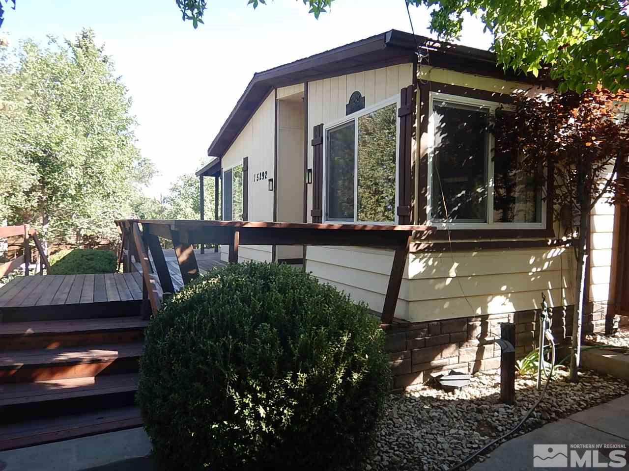 15292 Starr Grove Way Reno, NV 89521 - Photo 3 of 25 a view of a house with backyard and sitting area