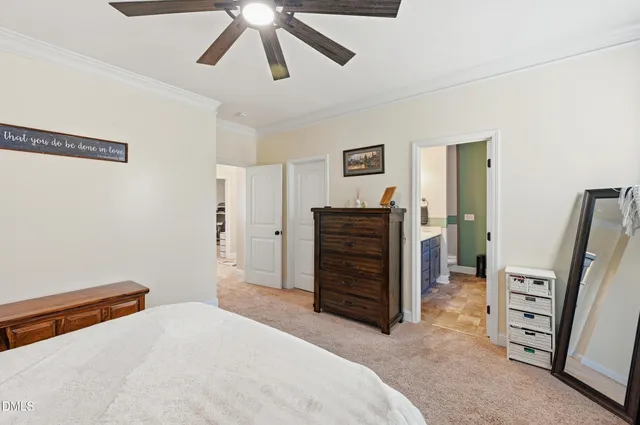 a bedroom with furniture and closet
