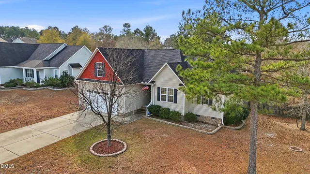 a house with trees in the background