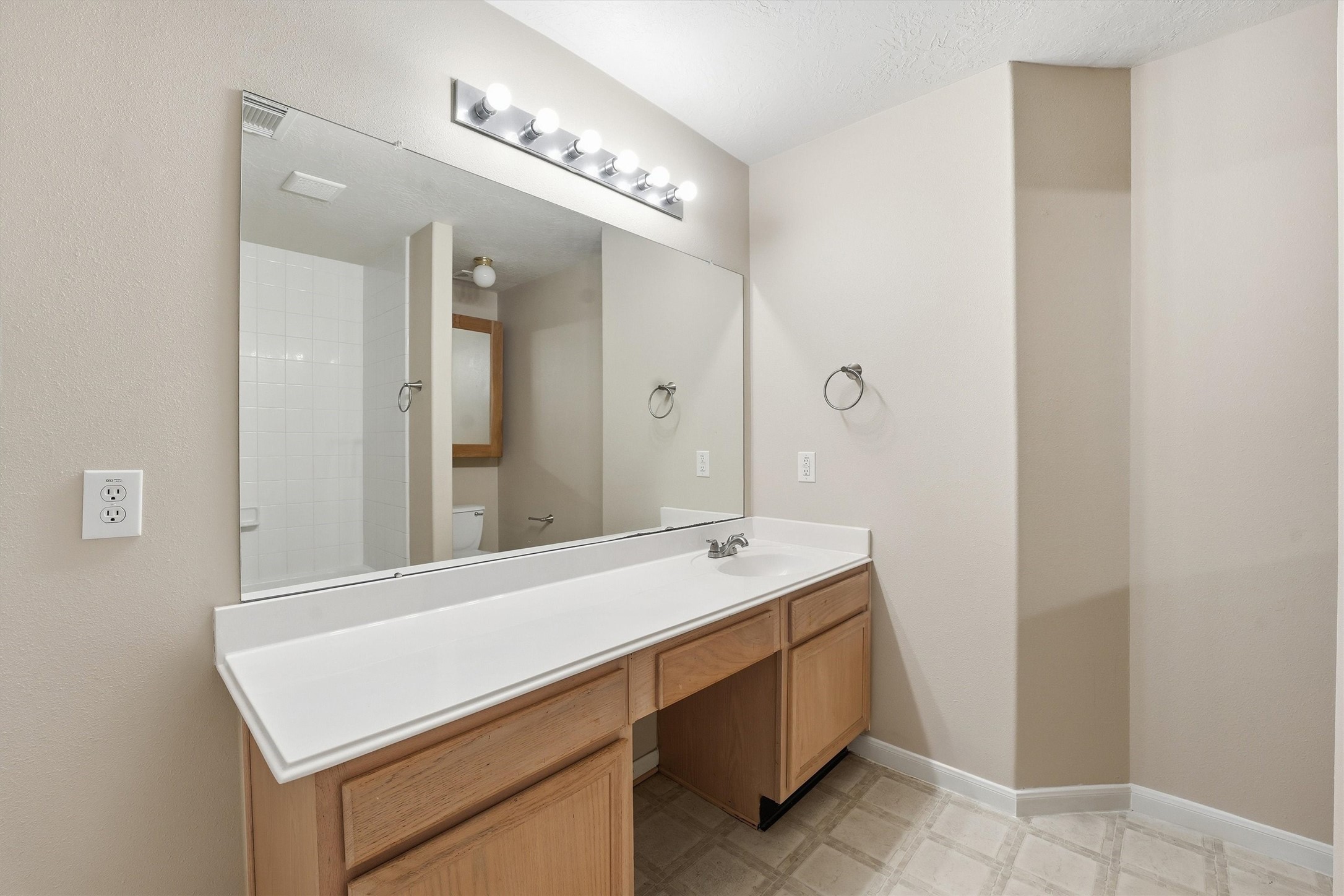 21543 Forest Colony Drive Porter, TX 77365 - Photo 15 of 32 Built in vanity with drawers and cabinet space