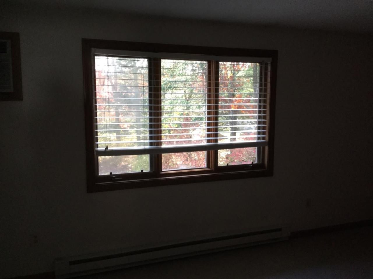 174 Lowell Road, Unit 57 Mashpee, MA 02649 - Photo 11 of 12 a view of a window in an empty room
