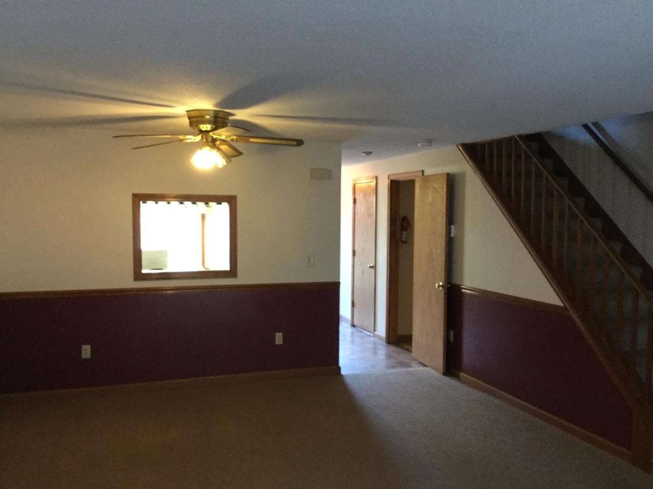 174 Lowell Road, Unit 57 Mashpee, MA 02649 - Photo 7 of 12 a view of livingroom with window