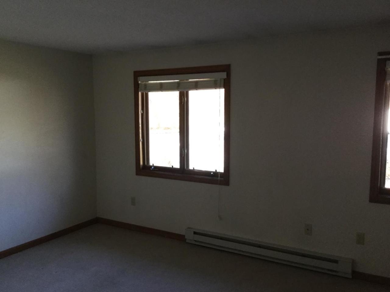 174 Lowell Road, Unit 57 Mashpee, MA 02649 - Photo 9 of 12 a small space with a window