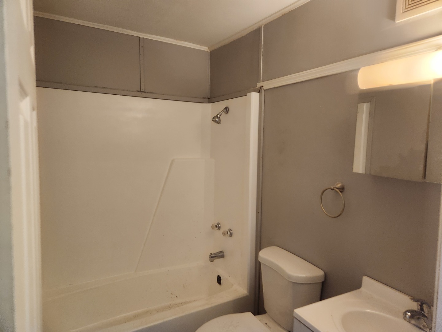 201-203 South Maple Street Toluca, IL 61369 - Photo 11 of 11 a bathroom with a toilet and a shower