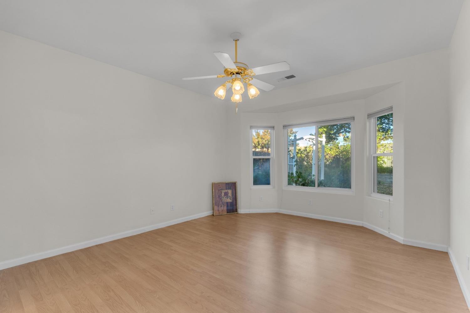 2573 Applegate Avenue Clovis, CA 93611 - Photo 12 of 26 a view of an empty room with a window