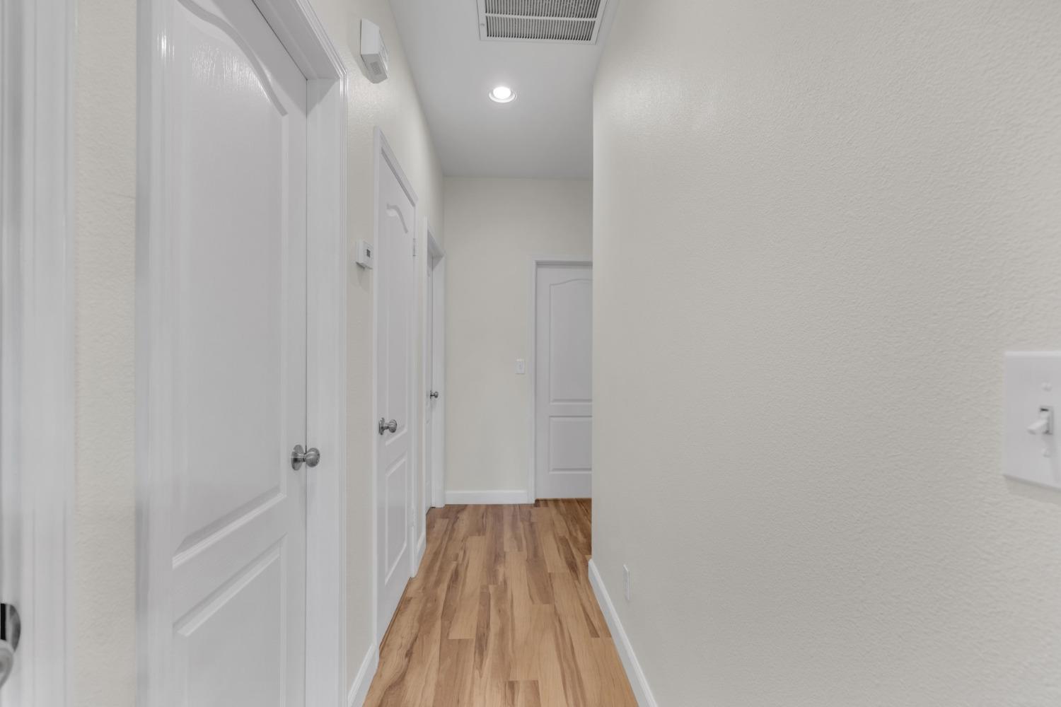2573 Applegate Avenue Clovis, CA 93611 - Photo 14 of 26 a view of a bathroom from the hallway