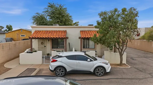 a car parked in front of a house