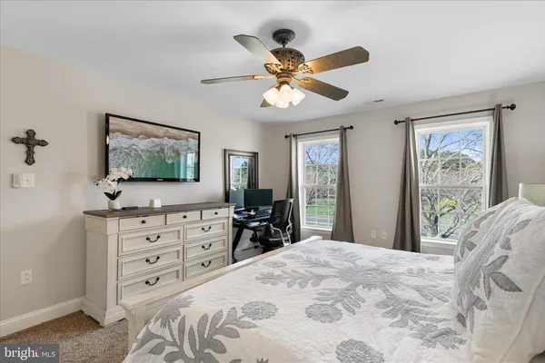 a bedroom with a bed and furniture