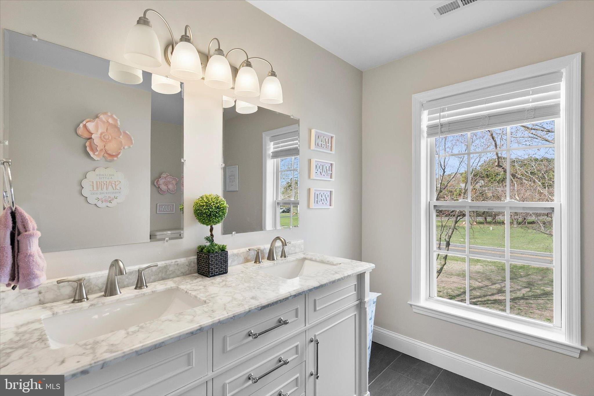 24697 Peterkins Road Georgetown, DE 19947 - Photo 37 of 54 Hall Bathroom