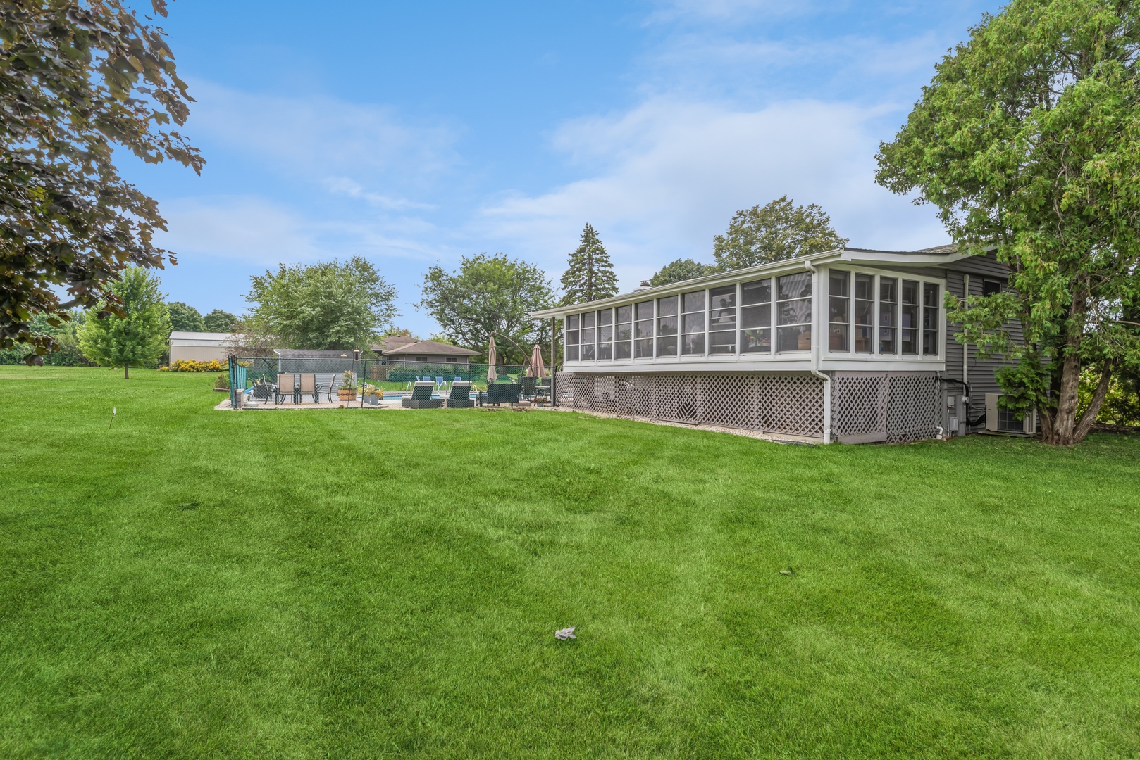 3308 Stieg Road Woodstock, IL 60098 - Photo 5 of 27 a view of a house with a yard balcony and sitting area