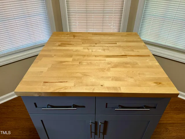 a en suite bathroom with a sink and a mirror
