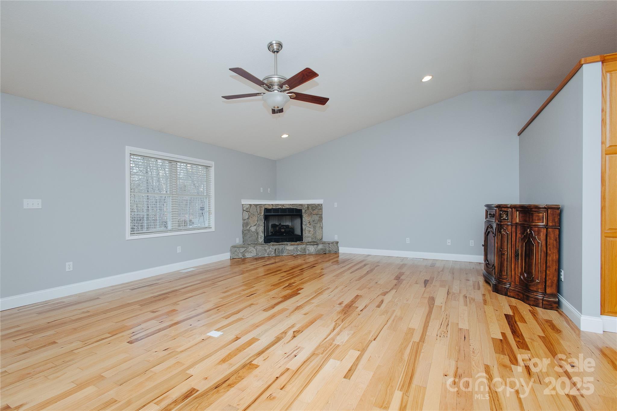 89 Bobcat Path Marion, NC 28752 - Photo 16 of 48 a view of empty room with wooden floor and fan
