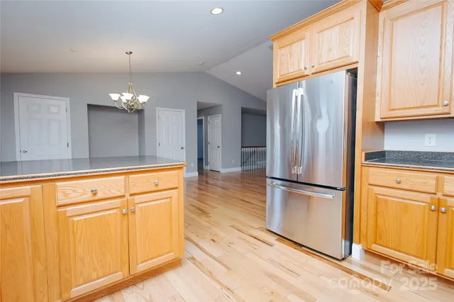 a view of a balcony with trees